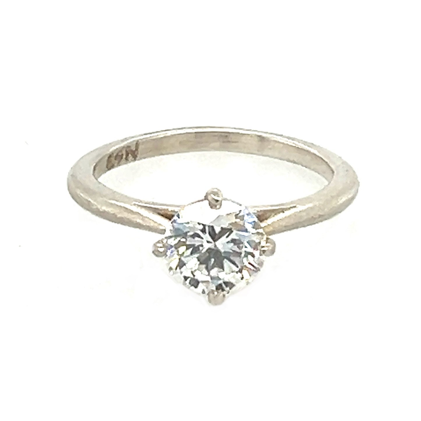 e. scott nuptials… The Compass Solitaire engagement ring
