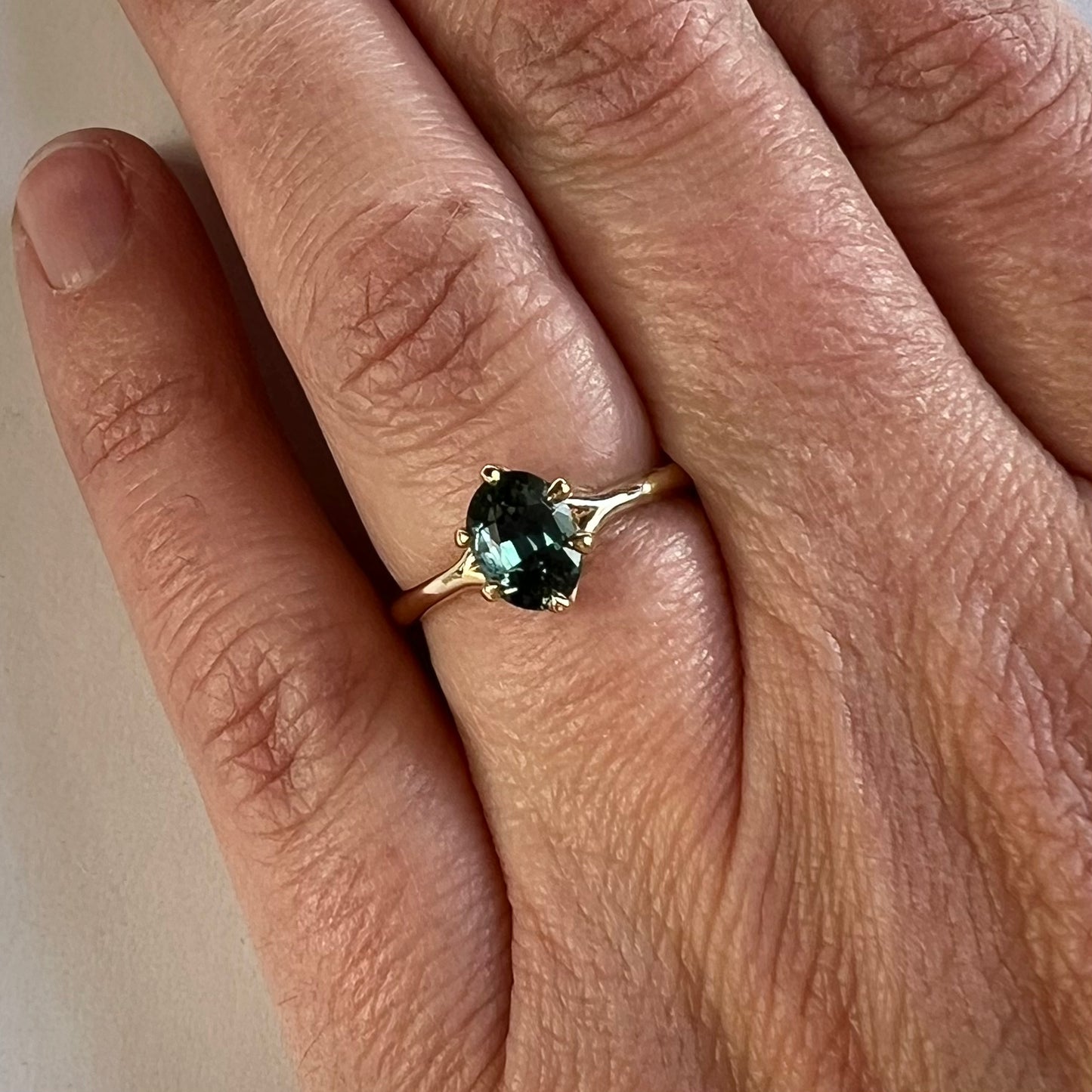 6 Prong Swoop- Teal sapphire & 14k Yellow Gold