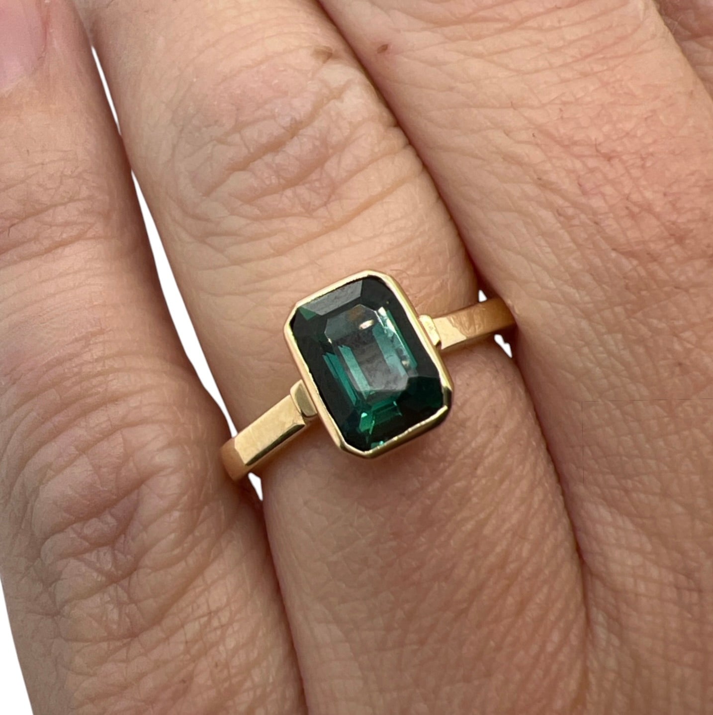 The Angled Bezel- Teal sapphire & 14k Yellow Gold