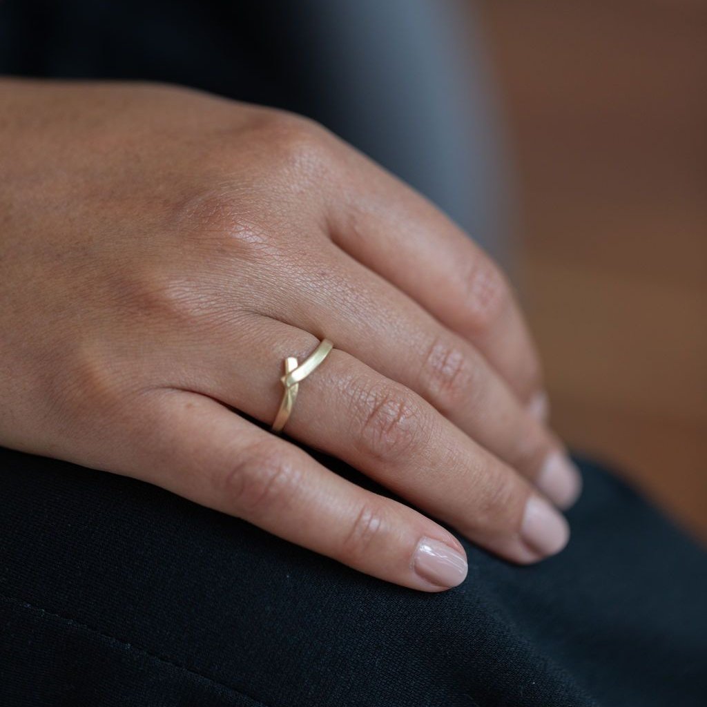 e. scott nuptials... The Hug Wedding Ring