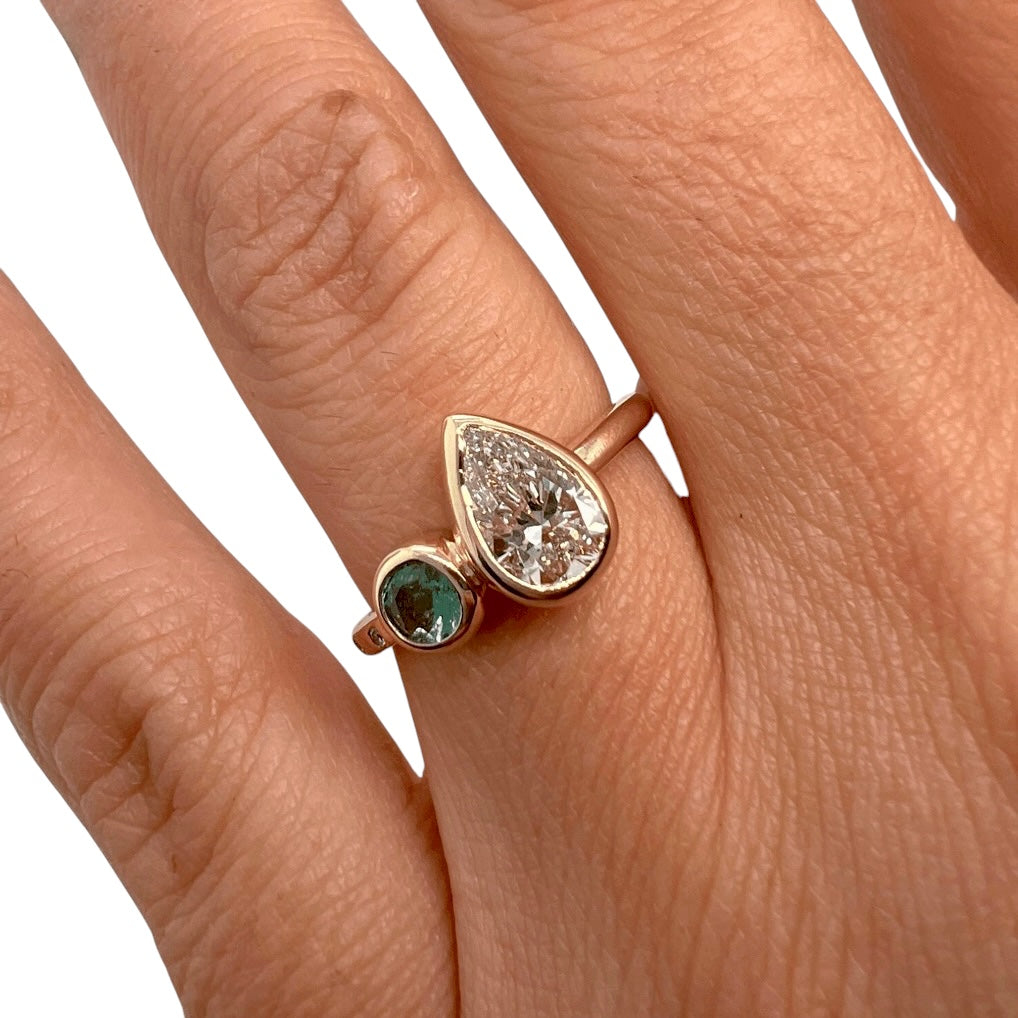 The Bezel Toi et Moi- LAB 1.08ct Pear diamond, Natural Emerald & 14k yellow gold