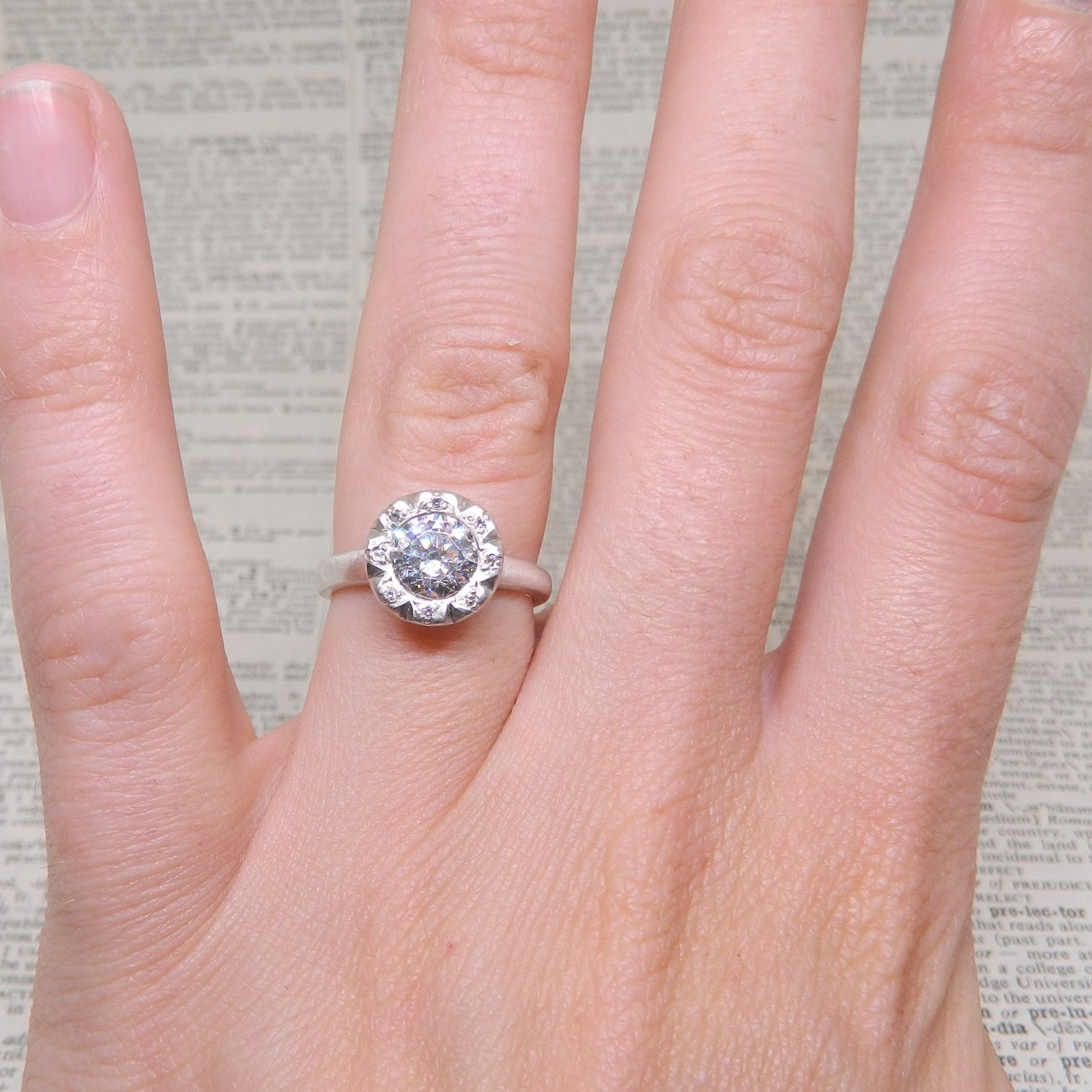 e. scott nuptials... The Modern Halo Engagement Ring